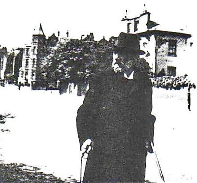 Waterhouse walking his Aberdeen terrier along Hall Road