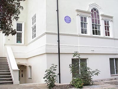 English Heritage Blue Plaque at 10 Hall Road, the former home of British painter John William Waterhouse